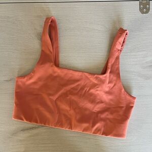 Never worn! Girlfriend Collective Terracotta Tommy Cropped sports bra